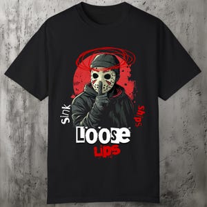 Loose Lips Sink Ships t-shirt featuring a street hustler mask graphic. Urban streetwear design with grunge-inspired details, perfect for hip-hop, trap style, and urban fashion lovers. Printed on Comfort Colors 1717 shirt for quality and durability.