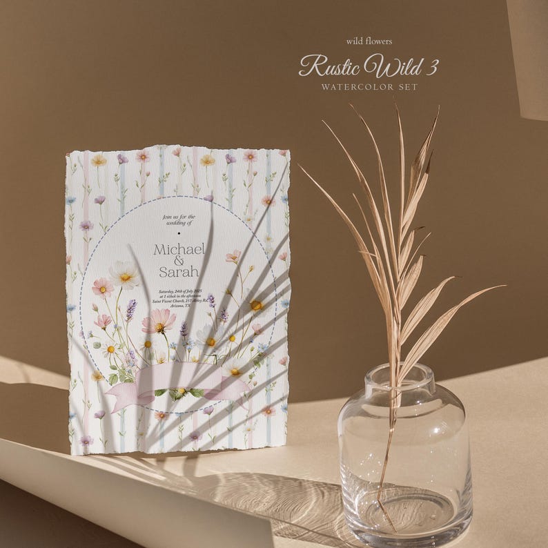 May include: A watercolor wedding invitation with floral illustrations. The invitation features the names "Michael & Sarah" and event details. The design includes a striped background and a decorative ribbon. A clear glass vase with a dried plant is in the background.