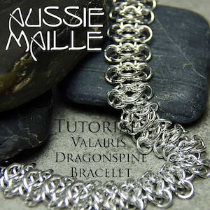 May include: A silver chainmail bracelet with a dragon spine design. The bracelet is on a gray background with the text "Tutorial Valaris Dragon Spine Bracelet".