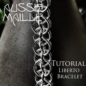 May include: A close-up of a silver chainmail bracelet with the text "TUTORIAL LIBERTO BRACELET" on a black background.