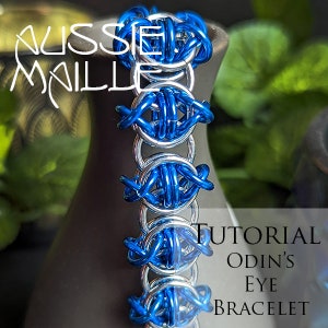 Op de afbeelding: Een blauwe en zilveren kettingbaard armband met een tutorial voor het maken van een "Odin's Eye" armband.