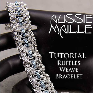 May include: A silver and blue chainmail bracelet with a tutorial for a "Ruffles Weave Bracelet" from Aussie Maille.