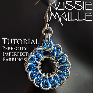 May include: A tutorial for making "Perfectly Imperfect" earrings using blue and silver chainmail. The earrings are round and have a simple design.