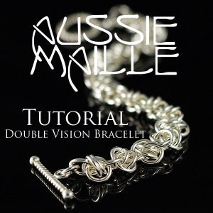 May include: A silver chain bracelet with a toggle clasp. The bracelet is made with a double vision weave pattern. The image includes the text "Aussie Malle Tutorial Double Vision Bracelet".