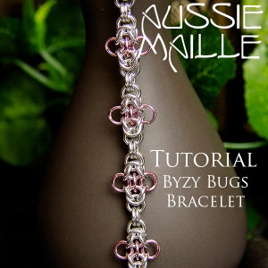 May include: A silver and pink chainmail bracelet with a tutorial for a "Byzy Bugs Bracelet". The bracelet is made with small, interlocking metal rings.