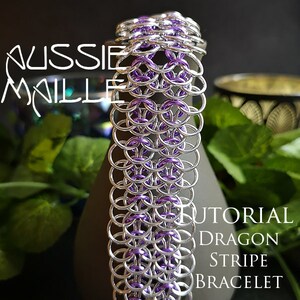 May include: A silver and purple chainmail bracelet with a dragon stripe pattern. The bracelet is made with small metal rings and is a tutorial for making a dragon stripe bracelet.