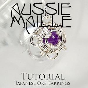 Puede incluir: Un tutorial para hacer pendientes de orbe japoneses. La imagen muestra un primer plano de un pendiente de orbe plateado con una piedra preciosa de amatista púrpura.
