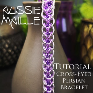 May include: A close-up of a silver and purple chainmail bracelet. The bracelet is made with a cross-eyed Persian weave. The text "TUTORIAL CROSS-EYED PERSIAN BRACELET" is visible in the image.