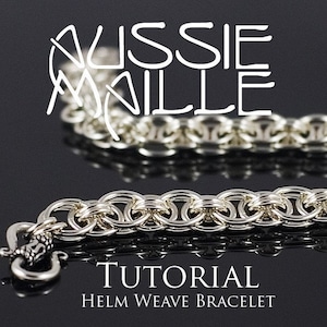 May include: A silver chainmail bracelet with a clasp. The bracelet is made with a helm weave pattern. The image includes the text "Aussie Maille Tutorial Helm Weave Bracelet".