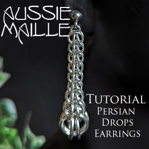 May include: Silver chain earrings with a Persian drop design. The earrings are long and dangle from the earlobe. The image includes the text "Tutorial Persian Drops Earrings".