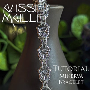 May include: A silver chainmail bracelet with a woven pattern, called a Minerva bracelet. The bracelet is displayed on a brown vase with the text "TUTORIAL MINERVA BRACELET" below it.