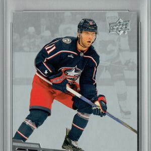 May include: A hockey trading card featuring Adam Fantilli in a Columbus Blue Jackets uniform. The card is labeled "Rookie Card" at the top and "Star Rookies" at the bottom. The player is in a skating pose.