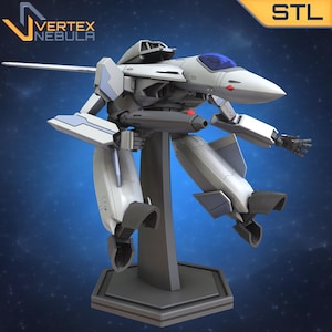 May include: A white and gray 3D printed model of a futuristic fighter jet, standing on a hexagonal base. The model is posed in a dynamic flying position with its wings spread and its guns pointed forward. The model is labeled "STL" in the upper right corner.