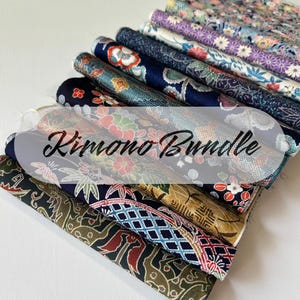 May include: A bundle of colourful fabric scraps with floral and geometric patterns. The fabric is labelled "Kimono Bundle".