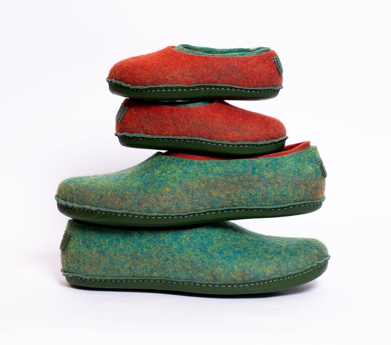2 pairs of matching BureBure felted wool slippers are designed for mom and daughter, dad and son. The inner part of these slippers is made of yellow semi soft wool while the outer part is decorated with natural beige alpaca wool.