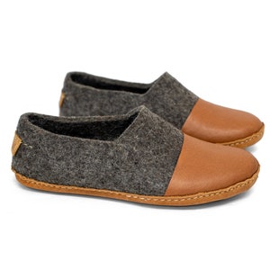 These BureBure handmade felted wool slippers for men are crafted entirely from natural wool. The natural felted wool offers a massaging effect on the skin and prevents sweating, keeping feet cool in warm and cozy in colder weather.