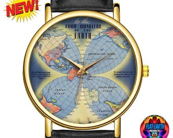 May include: A gold-tone wristwatch with a black leather strap features a vintage-style world map design on the face. The watch face reads "To the Four Quarters of the Earth".