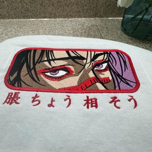 Anime embroidered hoodie, kawaii embroidered top, anime streetwear style, embroidered otaku tee, anime aesthetic outfit, custom anime jacket