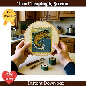May include: A cross-stitch embroidery hoop featuring a leaping trout design. The image includes green thread spools, embroidery tools, and the text "Trout Leaping in Stream" and "Easy Download". The DMC colors logo is also visible.