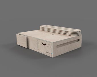 May include: A light wood storage bench with a pull-out drawer and a hinged top that folds down to create a seating surface. The bench has a small drawer on the side and the text "BRAVO WOOD" is printed on the front.