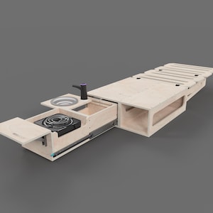 May include: A light-coloured wooden camper kitchen unit with a sink, tap, and a built-in electric stove. The unit also features a pull-out drawer and a slatted bed frame. The design is modern and space-saving.