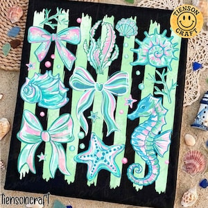May include: A black canvas featuring a design of bows, seashells, seahorses, and starfish in shades of blue, pink, and green. The design is set against a backdrop of vertical green stripes. The text "tiensoncraft" is visible.