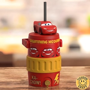 May include: A red cylindrical water cooler featuring Lightning McQueen graphics, the text "LIGHTNING MCQUEEN" and "KA-CHOW!", a yellow textured grip band, a small spigot at the base, and a lid topped with a Lightning McQueen figurine and a black straw.