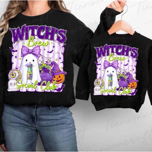 May include: Black sweatshirts with a Halloween-themed graphic. The design features a ghost with a purple bow, a cauldron, a jack-o'-lantern, and the text "Witch's Brew Social Club". The design is in purple, green, and white.