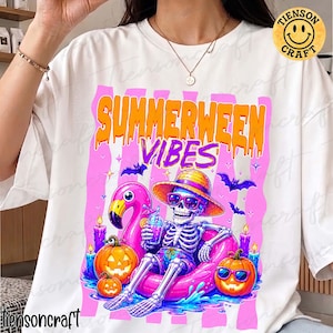 May include: White t-shirt with a colorful graphic that reads "Summerween Vibes". The design features a skeleton wearing sunglasses and a hat, relaxing on a pink flamingo floatie. Pumpkins, candles, and bats complete the design.