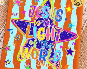 May include: A rectangular orange sign featuring a large dark blue star with a neon-colored border. The text reads "JESUS is the LIGHT of the WORLD John 8:12" in multi-colored lettering. Light blue wavy vertical stripes and small stars decorate the background.
