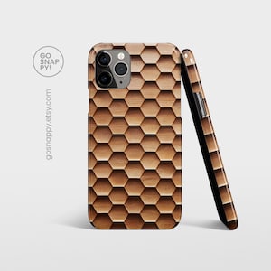 May include: A brown and black phone case with a honeycomb pattern. The case is designed for an iPhone.