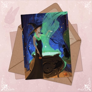May include: Illustration of a witch in a black dress and hat, stirring a cauldron with green smoke. A black cat sits nearby. The artwork is on a card inside a brown envelope, with a pink background.