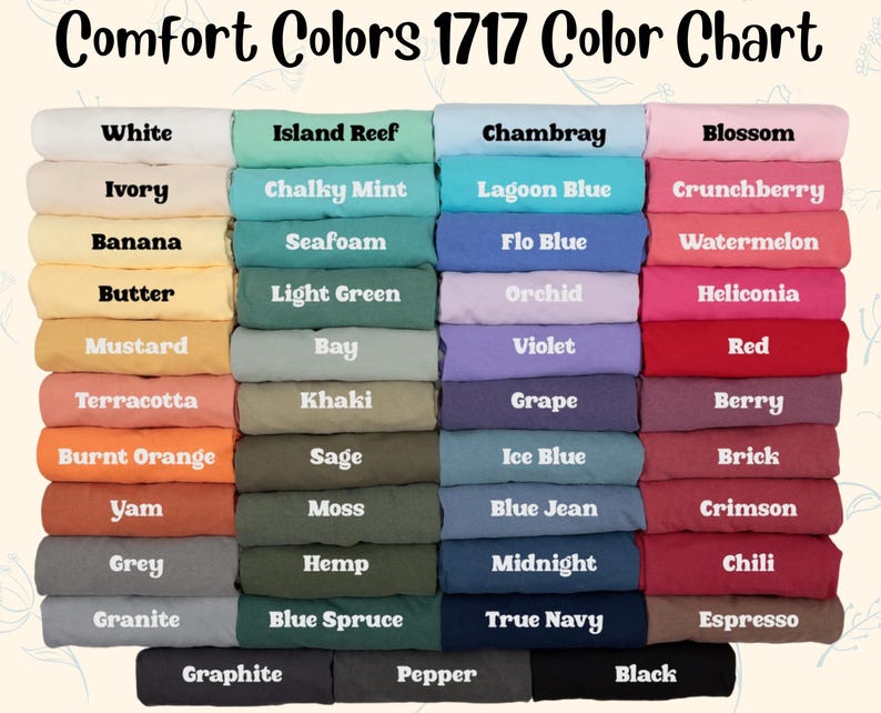 May include: A Comfort Colors 1717 color chart displaying a grid of folded t-shirts in various shades. The text reads Comfort Colors 1717 Color Chart, followed by labels for colors including White, Ivory, Banana, Butter, Mustard, Terracotta, Burnt Orange, Yam, Grey, Granite, Island Reef, Chalky Mint, Seafoam, Light Green, Bay, Khaki, Sage, Moss, Hemp, Blue Spruce, Chambray, Lagoon Blue, Flo Blue, Orchid, Violet, Grape, Ice Blue, Blue Jean, Midnight, True Navy, Blossom, Crunchberry, Watermelon, Heliconia, Red, Berry, Brick, Crimson, Chili, Espresso, Graphite, Pepper, and Black.