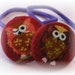 Reviewed by Anonymous reviewed WINK OWLS.........2 PONYTAIL HOLDERS