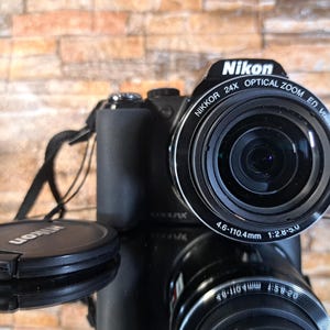 Black Nikon Coolpix P90 Very Cool Digital Camera - 12MP, 24X Optic Zoom, Nikkor 26-624mm Lens, Perfect for Travel & Photography
