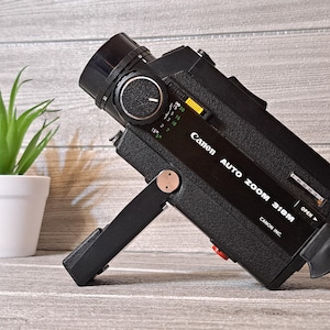 Cámara de película Canon 318 M con zoom automático Super 8