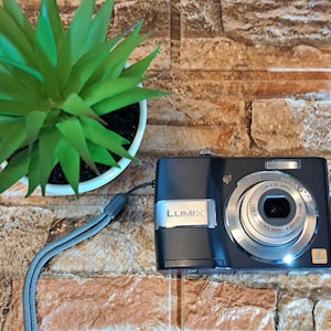 Vintage Panasonic Lumix Camera: Leica Lens, 8.1 MP, Collectible Photography