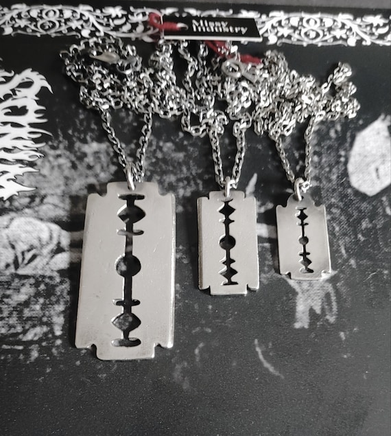 Razorblade necklace and pick pack