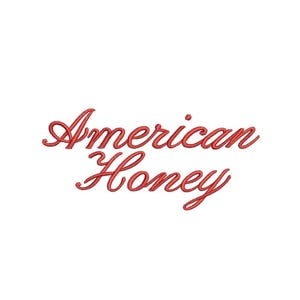 May include: The words "American Honey" are displayed in a cursive, red font against a white background. The text appears to be embroidered or stitched, with a slightly textured appearance.