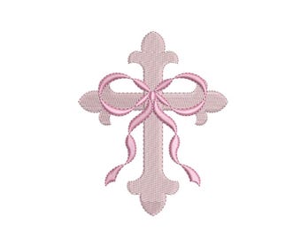 May include: A light pink embroidered cross with a pink bow. The cross has a detailed, textured design and is set against a white background. The bow is tied at the center of the cross and has flowing ribbons.