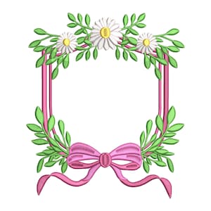 May include: A pink ribbon bow with a square frame decorated with white daisies and green leaves.