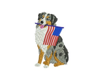 Op de afbeelding: Geborduurd beeld van een hond die een Amerikaanse vlag vasthoudt. De hond heeft een driekleurige vacht van zwart, wit en bruin. De vlag heeft rode en witte strepen en een blauw veld met witte sterren.
