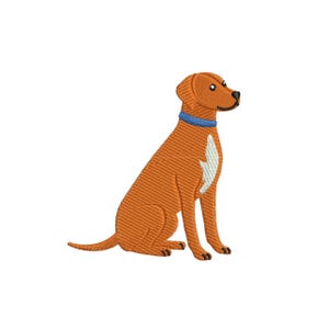 May include: An embroidered patch featuring a sitting dog with golden-brown fur, a blue collar, and a white patch on its chest. The design shows the dog in profile facing right, with detailed stitching defining its ears, tail, and paws.