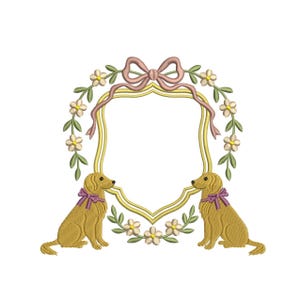 May include: Embroidered design featuring two golden retriever dogs with purple bows, flanking a gold-framed, shield-shaped space. The frame is adorned with a pink bow and floral accents, all set against a white background.