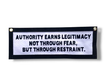 Authority Earns Legitimacy Felt Banner | Handmade Political Wall Art