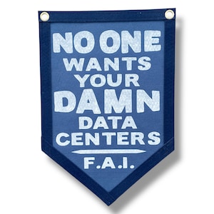 May include: A navy blue pennant with white text that reads "NO ONE WANTS YOUR DAMN DATA CENTERS F.A.I." The pennant has a dark blue border and two metal grommets at the top.