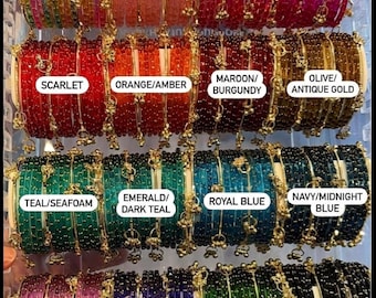 8 assorted colors of Raindrop bangles with 8 golden Kashmiri bangles
