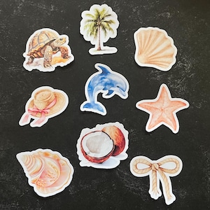 May include: A set of 10 colorful stickers featuring various summer and beach themes. The stickers include a turtle, a palm tree, a seashell, a dolphin, a starfish, a coconut, a hat, and a bow.