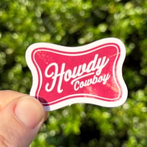 Howdy Cowboy Sticker – Funny Western Beer-Inspired Decal, Retro Country Aesthetic, Vinyl Sticker for Laptops, Water Bottles & Notebooks