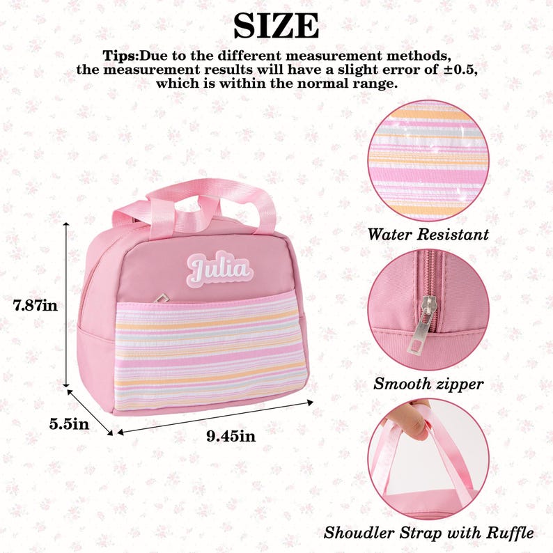 May include: Pink lunch bag with a striped front pocket and the name "Julia". The bag is 7.87 inches tall, 9.45 inches wide, and 5.5 inches deep. Features include a smooth zipper, water resistance, and a shoulder strap with a ruffle.